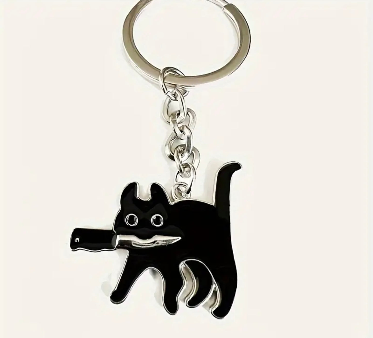 Kitty with knife keychain